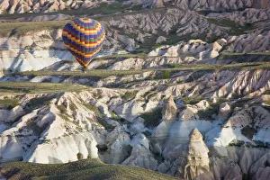 Hot Air Balloon flight over Volcanic tufa rock formations, Goreme, Cappadocia, Anatolia Hot Air Balloon flight over Volcanic tufa rock formations, Goreme, Cappadocia, Anatolia