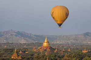 A hot air balloon flying over Dhammayazika temple, UNESCO, Pwasaw, Old Bagan A hot air balloon flying over Dhammayazika temple, UNESCO, Pwasaw, Old Bagan