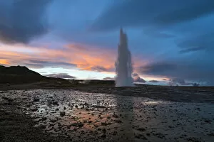 Sudurland Region Gallery: Hot spring splashing at Strokkur during sunset, Geysir, South Iceland, Iceland