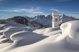The huts and the bell tower at Alpe Scima covered in snow. Alpe Scima, valchiavenna The huts and the bell tower at Alpe Scima covered in snow. Alpe Scima, valchiavenna