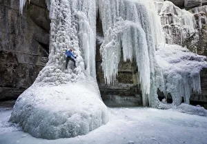 Ice Climber on the Queen Frozen Waterfall, Maligne Canyon, Jasper National Park, Alberta Ice Climber on the Queen Frozen Waterfall, Maligne Canyon, Jasper National Park, Alberta