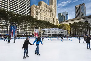 Ice skating in Bryant Park, Manhattan, New York, USA Ice skating in Bryant Park, Manhattan, New York, USA