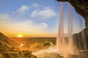 Images Dated 22nd August 2014: Iceland, Seljalandsfoss at sunset, waterfall and sun