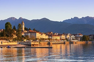 The idyllic lakeside village of Baveno illuminated at sunrise, Lake Maggiore, Piedmont The idyllic lakeside village of Baveno illuminated at sunrise, Lake Maggiore, Piedmont