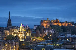 Illuminated Edinburgh Castle against blue sky at dusk viewed from Observatory House Illuminated Edinburgh Castle against blue sky at dusk viewed from Observatory House