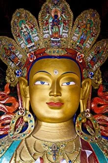 Remote Gallery: India, Ladakh, Thiksey. The immense and beautifully gilded Maitreya Buddha in the Chamkhang temple