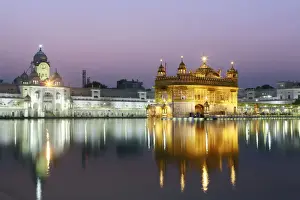 Golden Temple Prints: Print of India, Punjab, Amritsar's Golden Temple at dusk