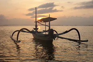Indonesia, Bali, Sanur, fishing outriggers at dawn Indonesia, Bali, Sanur, fishing outriggers at dawn