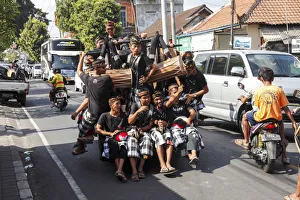 Indonesia, Bali, small truck carrying musicians Indonesia, Bali, small truck carrying musicians