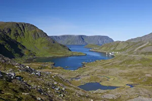 Isolated fishing village in luna like Landscape, Kamoyvaer, Nordkapp, Norway Isolated fishing village in luna like Landscape, Kamoyvaer, Nordkapp, Norway
