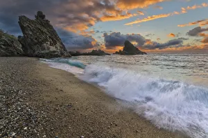 Italy, Calabria , Sunset at Ulivarella Rock Italy, Calabria , Sunset at Ulivarella Rock