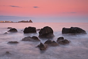 Italy, Sicilia, Sicily, Last light at dusk, in the background the Cyclopes stacks Italy, Sicilia, Sicily, Last light at dusk, in the background the Cyclopes stacks