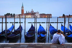 Veneto Collection: Italy, Veneto, Venice, Sestier of San Marco, Moored gondolas with San Giorgio Maggiore