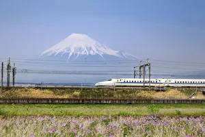 Japan, Shizuoka Prefecture, Yoshiwara, Mt Fuji and Shinkansen Series N700A bullet train Japan, Shizuoka Prefecture, Yoshiwara, Mt Fuji and Shinkansen Series N700A bullet train