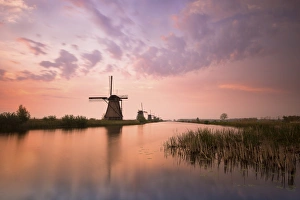Kinderdijk, Netherlands The windmills of Kinderdijk resumed at sunrise Kinderdijk, Netherlands The windmills of Kinderdijk resumed at sunrise