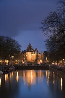 Kloveniers Burgwal canal and Waag Historic building, Nieuwmarkt, Amsterdam, Holland Kloveniers Burgwal canal and Waag Historic building, Nieuwmarkt, Amsterdam, Holland