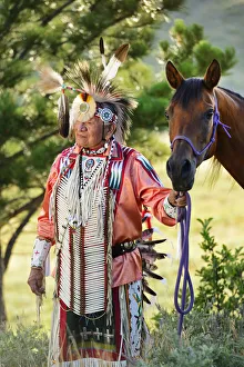 Lakota Indian in the Black Hills with Horse, Western South Dakota, USA. MR Lakota Indian in the Black Hills with Horse, Western South Dakota, USA. MR