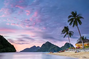 Las Cabanas Beach Resort on Marimegmeg Beach at sunset, El Nido, Palawan, Philippines Las Cabanas Beach Resort on Marimegmeg Beach at sunset, El Nido, Palawan, Philippines