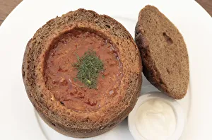 Latvian Sauerkraut Soup with Pork Served in a Bread Loaf. Riga, Latvia, Northern Europe Latvian Sauerkraut Soup with Pork Served in a Bread Loaf. Riga, Latvia, Northern Europe