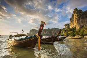 Longtail boats on West Railay beach, Railay Peninsula, Krabi Province, Thailand Longtail boats on West Railay beach, Railay Peninsula, Krabi Province, Thailand