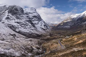 Looking down the pass of Glencoe with snow over the Three Sisters of Glencoe, Highland Looking down the pass of Glencoe with snow over the Three Sisters of Glencoe, Highland