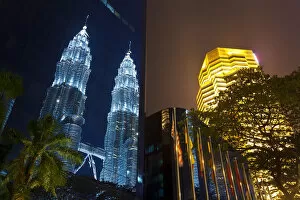 Images Dated 11th June 2012: Low angle reflected iew of the Petronas Twin Towers, Kuala Lumpur, Malaysia