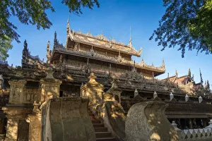 Low angle view of Shwenandaw Monastery made of teak wood, Mandalay, Mandalay Region Low angle view of Shwenandaw Monastery made of teak wood, Mandalay, Mandalay Region