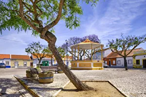 The main square of the fishing village of Rosario with the traditional bandstand, Moita The main square of the fishing village of Rosario with the traditional bandstand, Moita