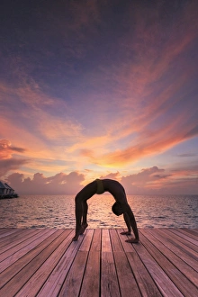 Maldives, South Ari Atoll, Thudufushi Island, Diamonds Thudufushi Resort, man practising Maldives, South Ari Atoll, Thudufushi Island, Diamonds Thudufushi Resort, man practising
