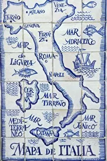 Milan Gallery: Map of Italy and the Mediterranean made out of ceramic tiles on a street in Seville