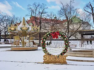 Prints of Merry go round and Christmas Decorations at Mariensztat Market Square Warsaw Masovian Voivodeship Poland