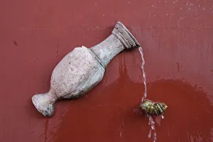 Mexico, A fountain pouring water on a hand Mexico, A fountain pouring water on a hand