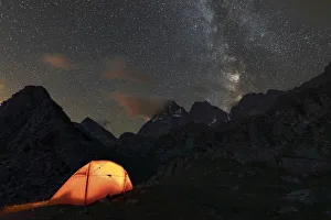 The Monviso Peak and the Milky Way in a summer night from the Fiorenza Lake (Pian del Re The Monviso Peak and the Milky Way in a summer night from the Fiorenza Lake (Pian del Re
