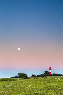Full moon over lighthouse, Falshoft, Baltic coast, Schleswig-Holstein, Germany Full moon over lighthouse, Falshoft, Baltic coast, Schleswig-Holstein, Germany