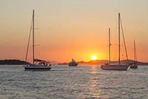 Mooring sailboats during the sunset, Ile de Porquerolles, Hyeres, Toulon, Var department Mooring sailboats during the sunset, Ile de Porquerolles, Hyeres, Toulon, Var department