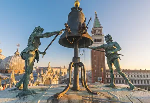 The Moors on top of the St Marks Clock Tower, St Marks Square, Venice, Veneto, Italy The Moors on top of the St Marks Clock Tower, St Marks Square, Venice, Veneto, Italy