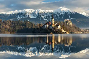 Morning sunlight over Church of the Assumption of Mary, Lake Bled, Upper Carniola Morning sunlight over Church of the Assumption of Mary, Lake Bled, Upper Carniola