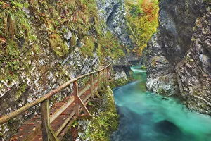 Mountain brook with wooden footbridges through canyon - Slovenia, Gorenjska, Bled Mountain brook with wooden footbridges through canyon - Slovenia, Gorenjska, Bled