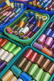 Myanmar (Burma), Yangon, Street Market, Display of Colourful Cotton Bobbins Myanmar (Burma), Yangon, Street Market, Display of Colourful Cotton Bobbins