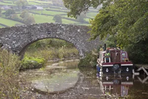 Narrowboat on the Monmouthshire & Brecon Canal in the Brecon Beacons National Park Narrowboat on the Monmouthshire & Brecon Canal in the Brecon Beacons National Park