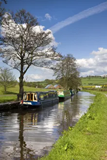 Narrowboats moored on the Monmouthshire and Brecon Canal near Pencelli, Brecon Beacons Narrowboats moored on the Monmouthshire and Brecon Canal near Pencelli, Brecon Beacons