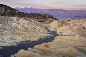 Natural rock formations at Zabriskie Point during sunrise, Death Valley National Park