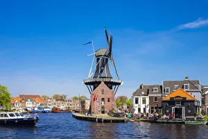 Netherlands, North Holland, Haarlem. Windmill De Adriaan on the Spaarne River Netherlands, North Holland, Haarlem. Windmill De Adriaan on the Spaarne River