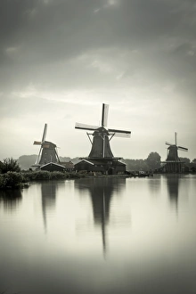 Netherlands, North Holland, Zaandam, Zaanse Schans, left to right The Seeker (De Zoeker) Oilmill Netherlands, North Holland, Zaandam, Zaanse Schans, left to right The Seeker (De Zoeker) Oilmill