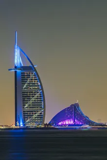 Night view of Burj al Arab and Jumeirah Beach Hotel, Dubai, United Arab Emirates Night view of Burj al Arab and Jumeirah Beach Hotel, Dubai, United Arab Emirates