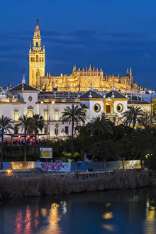 Night view of city skyline with Cathedral and Giralda bell tower, Seville, Andalusia Night view of city skyline with Cathedral and Giralda bell tower, Seville, Andalusia
