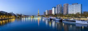 Night view of River Seine with high-rise buildings on the Left Bank, and Eiffel Tower Night view of River Seine with high-rise buildings on the Left Bank, and Eiffel Tower