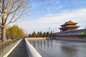 North Gate and moat of Forbidden City with CITIC Tower in background, Beijing, China North Gate and moat of Forbidden City with CITIC Tower in background, Beijing, China