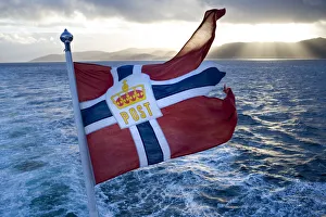 Norwegian flag, on the Hurtigruten coastal express, Northern Norway Norwegian flag, on the Hurtigruten coastal express, Northern Norway