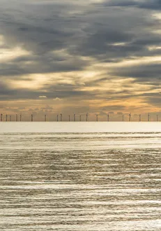 Offshore wind farm as viewed from Brighton beach, East Sussex, England Offshore wind farm as viewed from Brighton beach, East Sussex, England